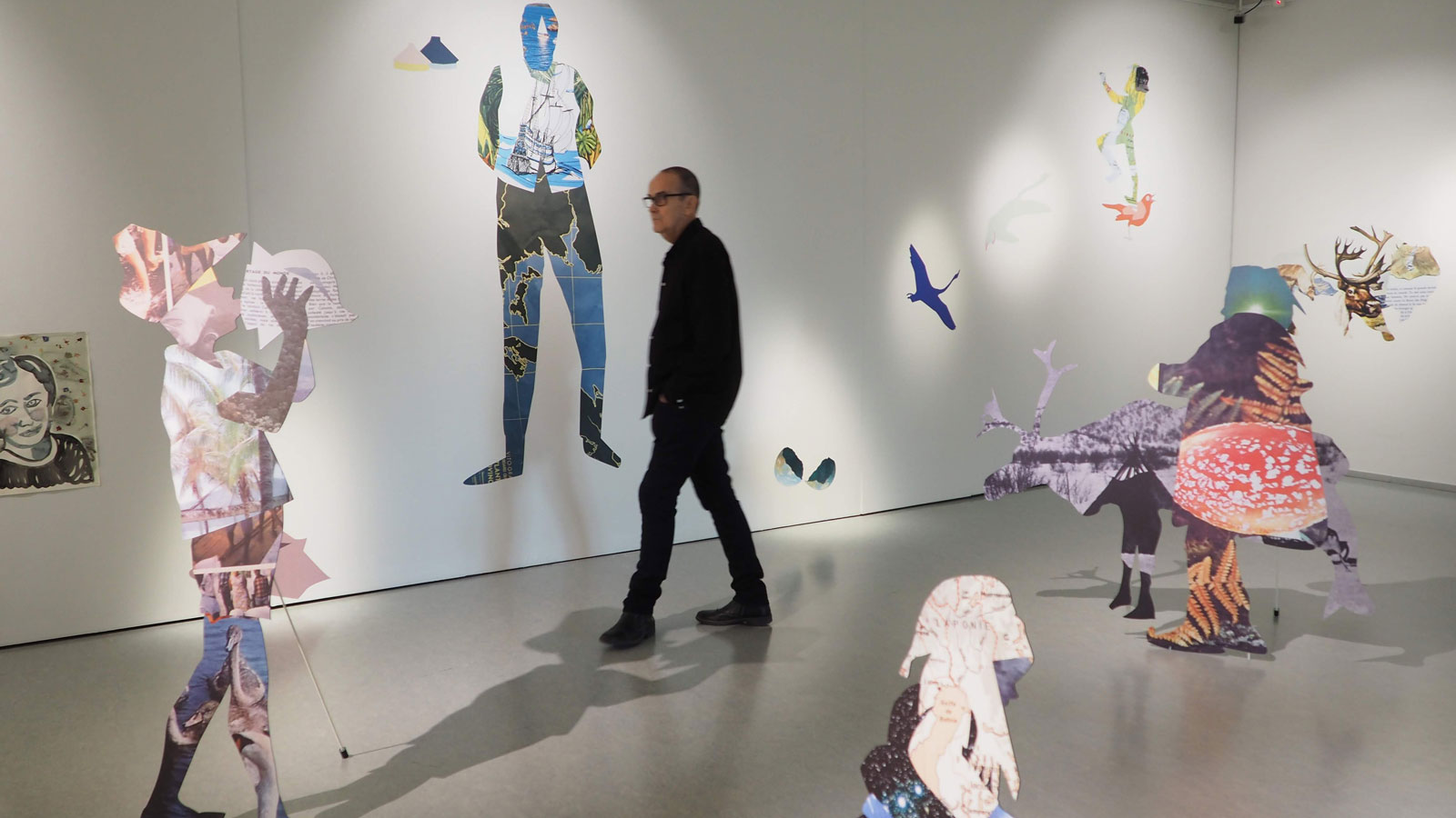 Person walking in a museum.