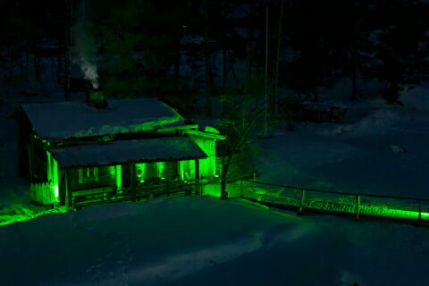 A sauna lightened up green.
