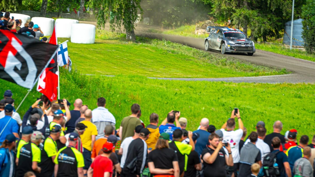 Rally car driving on a gravel road of Jyväskylä Region