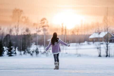 A person outside in a winter landscape.