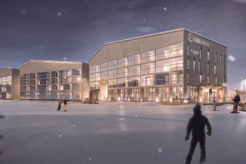 Illustrative image of Break Sokos Hotel Himos from the outside in a winter landscape with people outside as well.