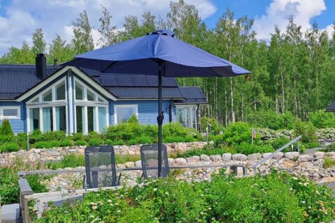 A blue villa from the outside.