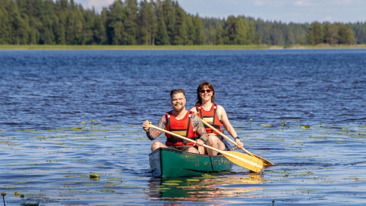 Two people are paddling.